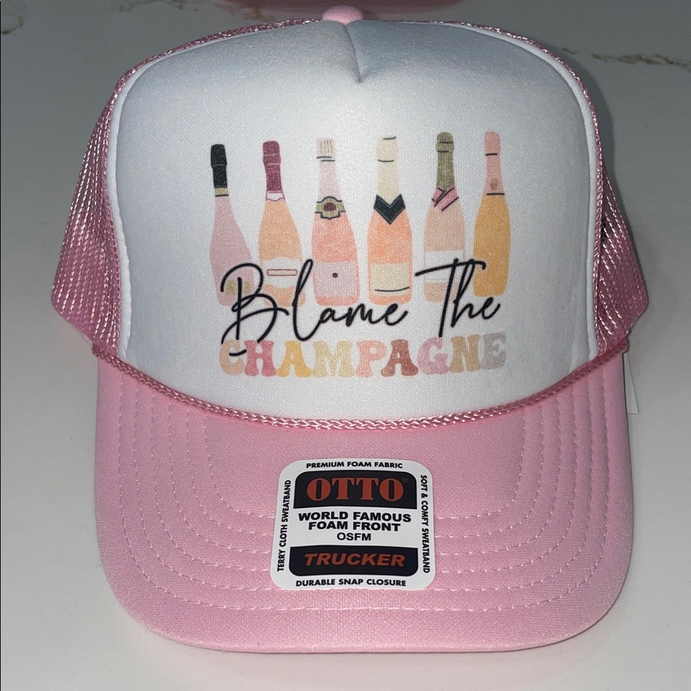 BLAME IT ON THE CHAMPAGNE Pink and White Trucker Hat